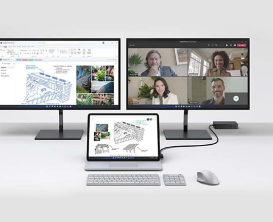 Surface Laptop Studio connecté à deux écrans externes afin de mettre les ports en évidence