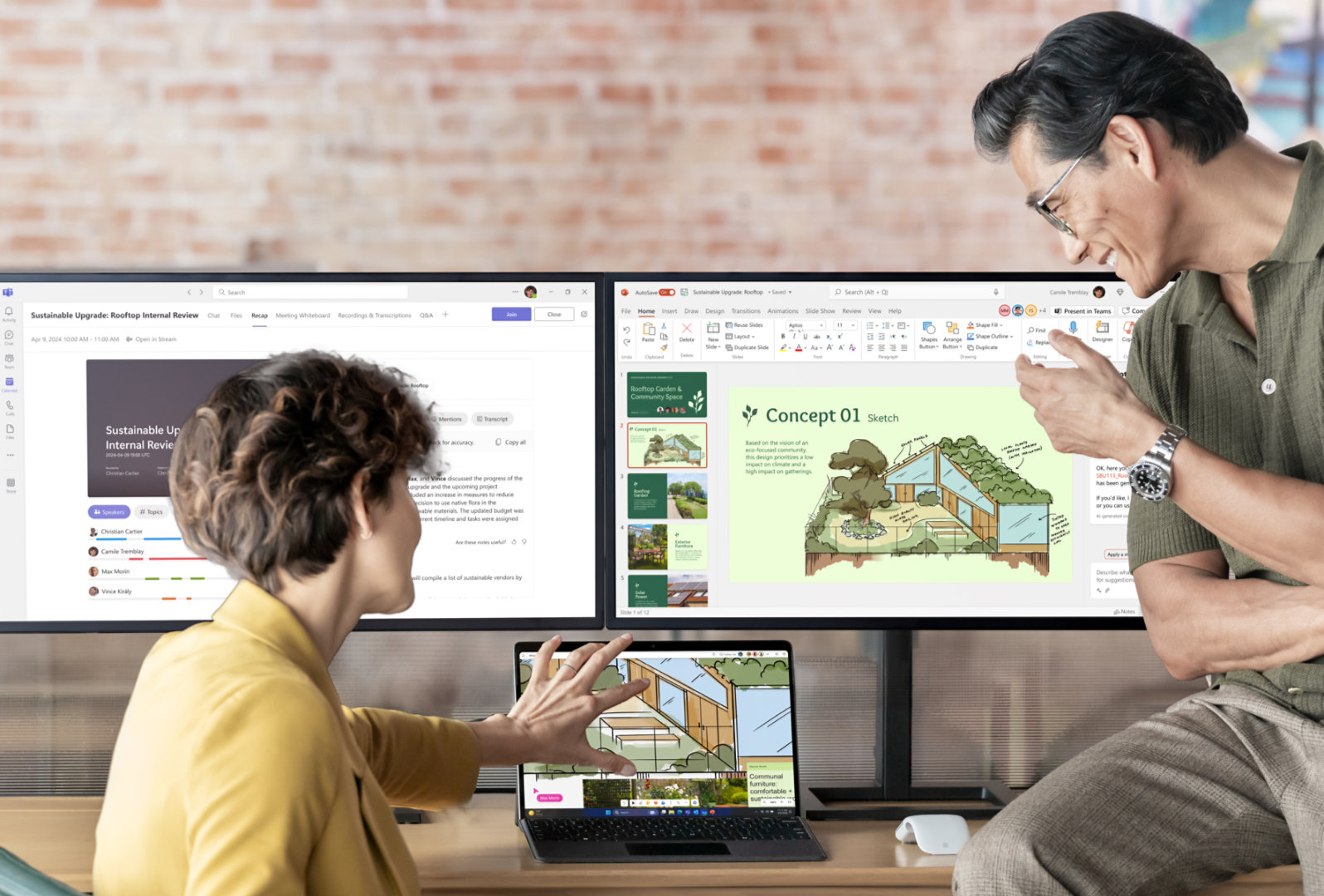Mies ja nainen katsovat pöydän ääressä Surface Pro 10 -laitetta, joka on liitetty kahteen näyttöön, joissa esitellään Microsoft 365 -sovelluksia