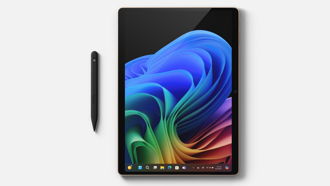 Surface Pro 11ᵗʰ Edition with Surface Slim Pen beside it