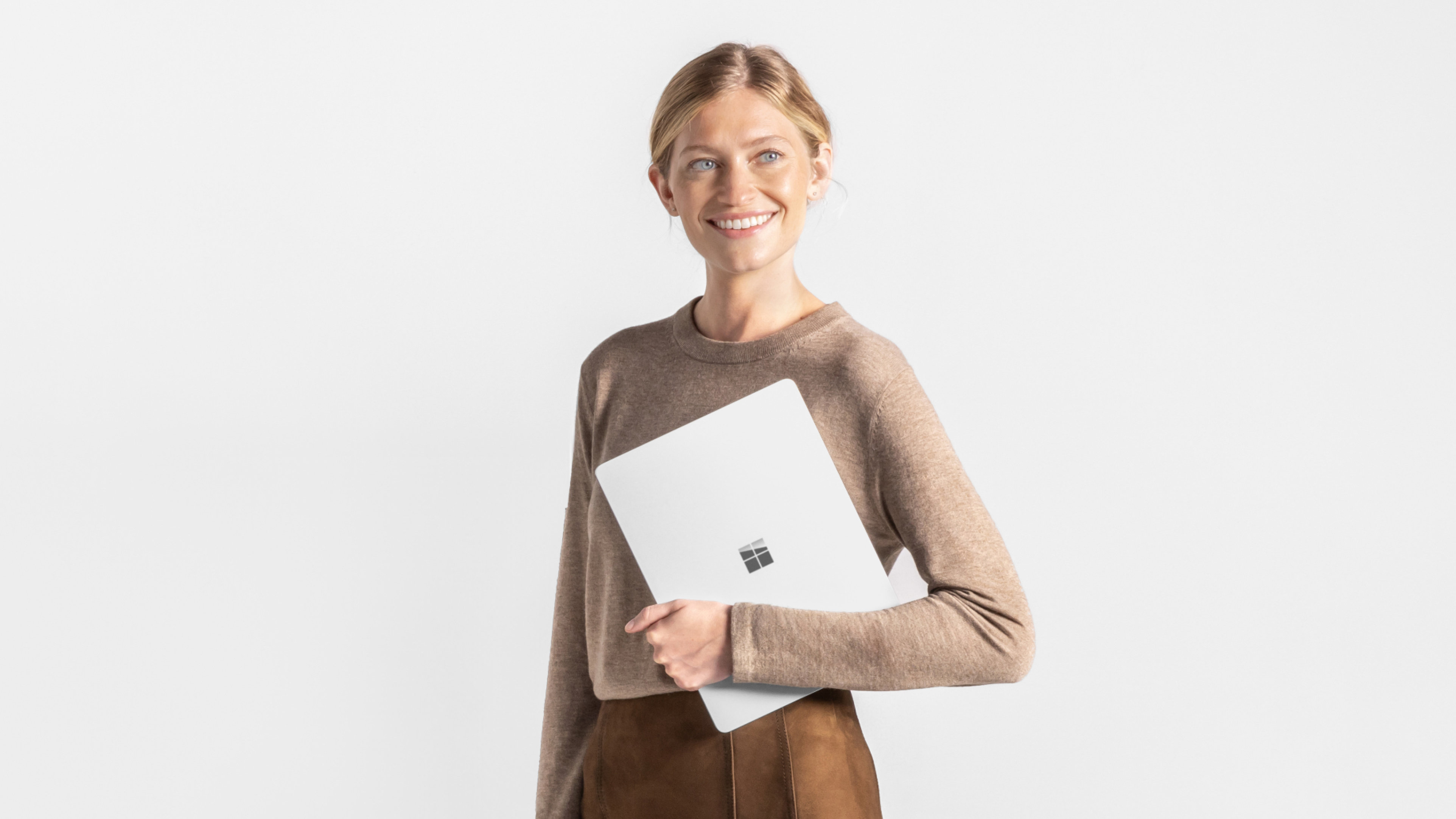 A person holding a Surface device