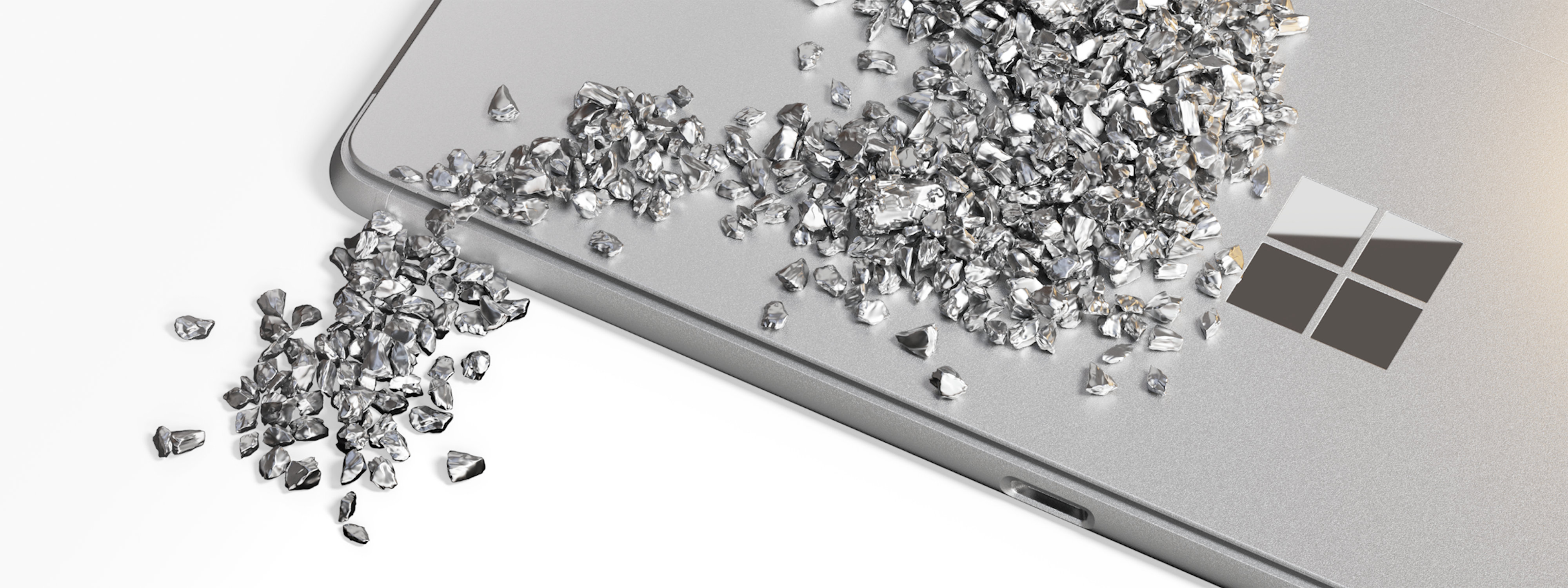 Ein Bild, das das geschlossene Surface Pro zeigt, mit Partikeln in einem Wellenmuster über dem Gerät, das die Verwendung von recycelten Materialien symbolisiert.