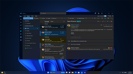 A Microsoft Outlook inbox in dark mode open on a Windows dark desktop background