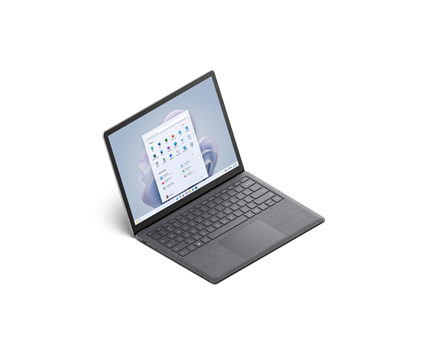 Bild av en platinafärgad Surface Laptop 5 på 13,5 tum sett snett ovanför och i trefjärdedelsvy.