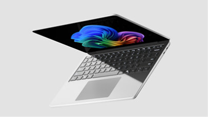 A Windows 11 Pro laptop open and dramatically tipped