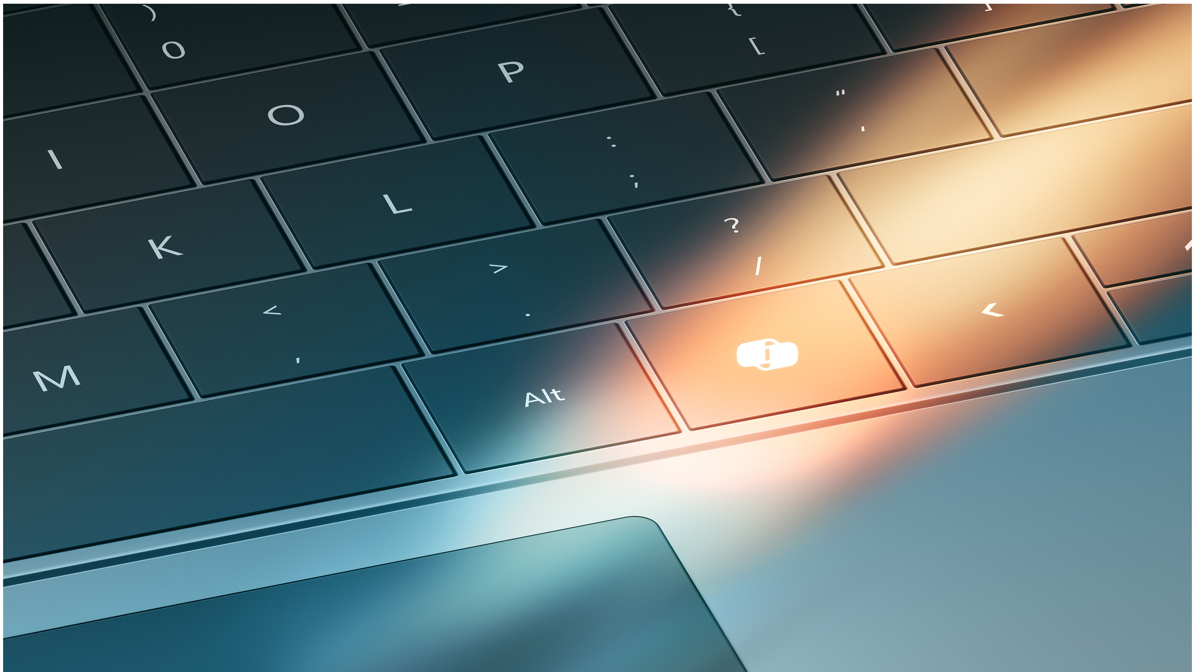 A closeup of a Surface Laptop keyboard with a light focused on the Copilot key