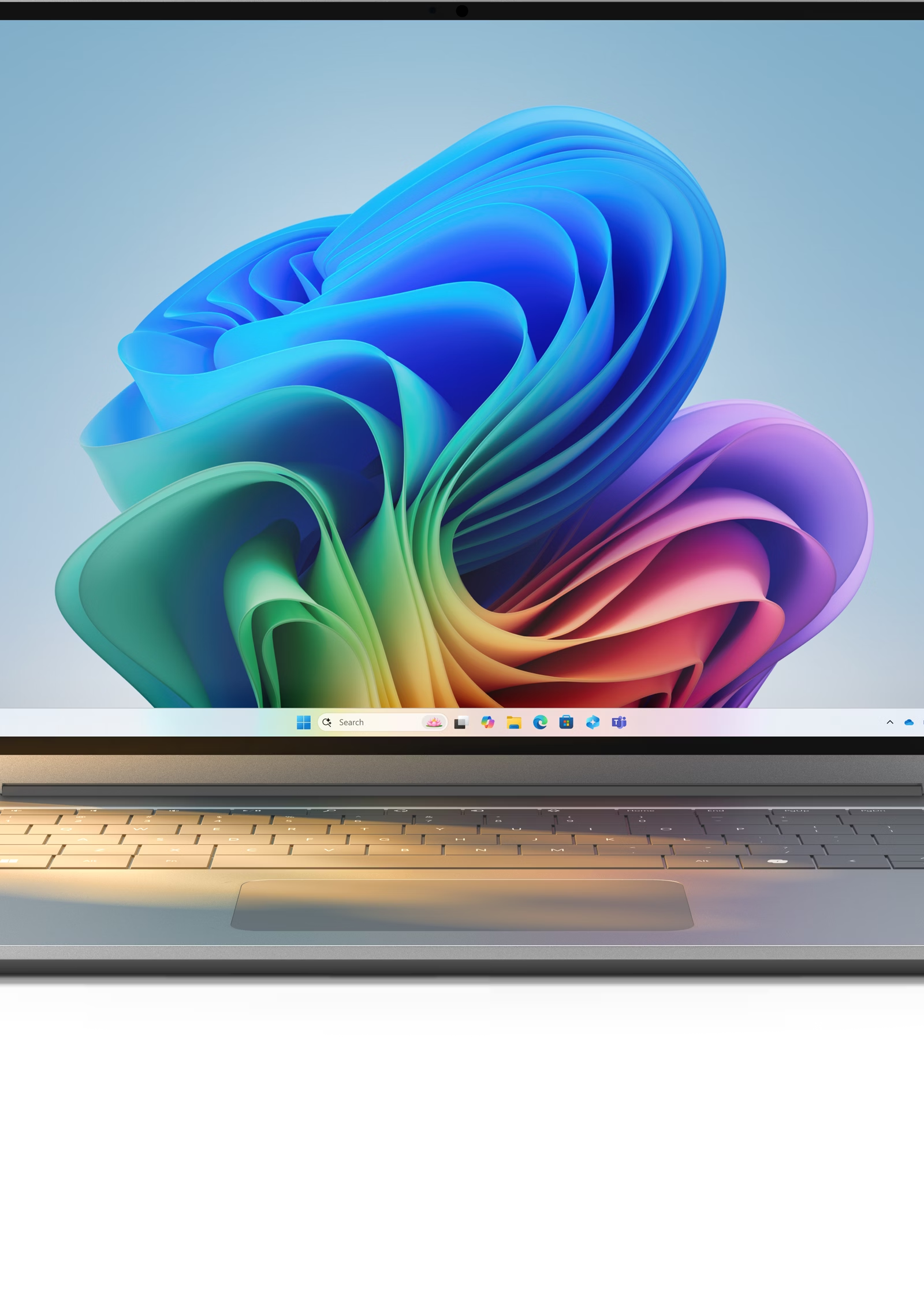 Laptop displaying the Windows 11 desktop and Start menu
