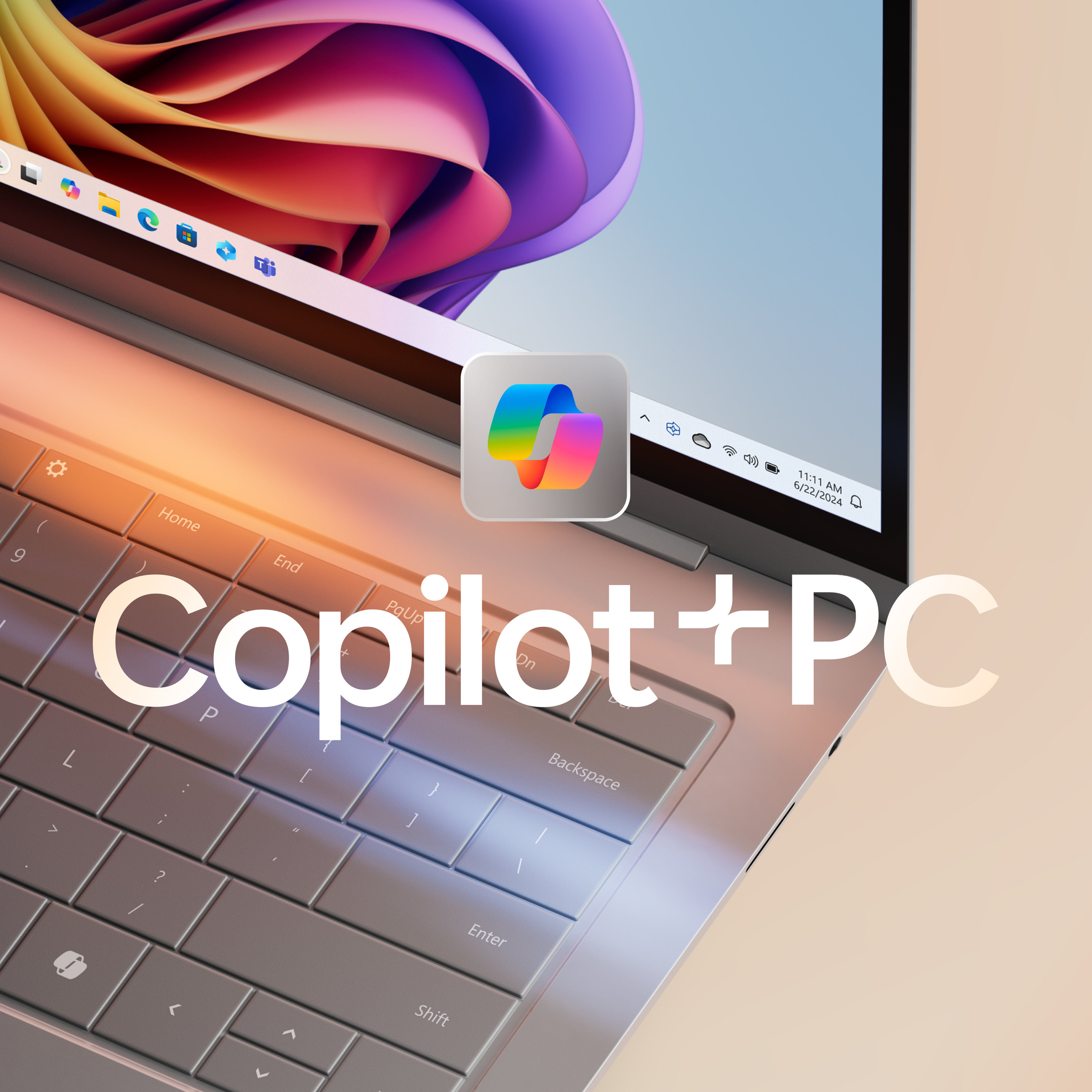 A Windows 11 PC with colourful bloom and Copilot icon on the screen
