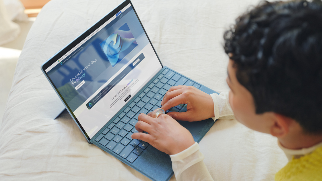 Woman looking at a Surface device