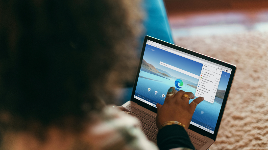 Woman using Microsoft Edge on laptop