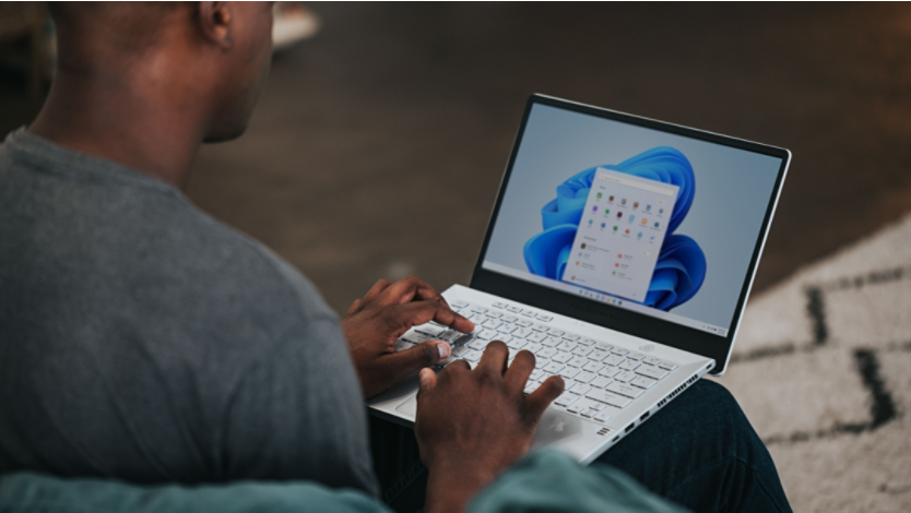 a man searching in his Surface device settings