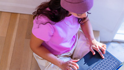 A female student exploring software for study on her Copilot+ PC