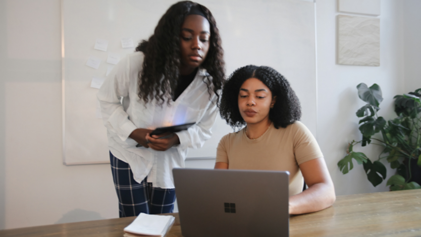 Two girls using a Surface Laptop
