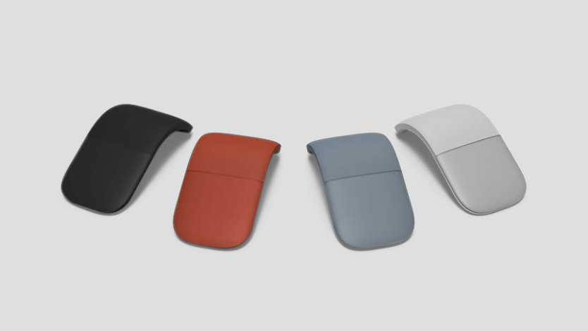 render of Surface Arc Mouse in four colours: Black, Poppy Red, Ice Blue and Platinum