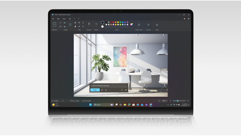 生成フィルを使用したペイントを表示している、開いているノート PC。