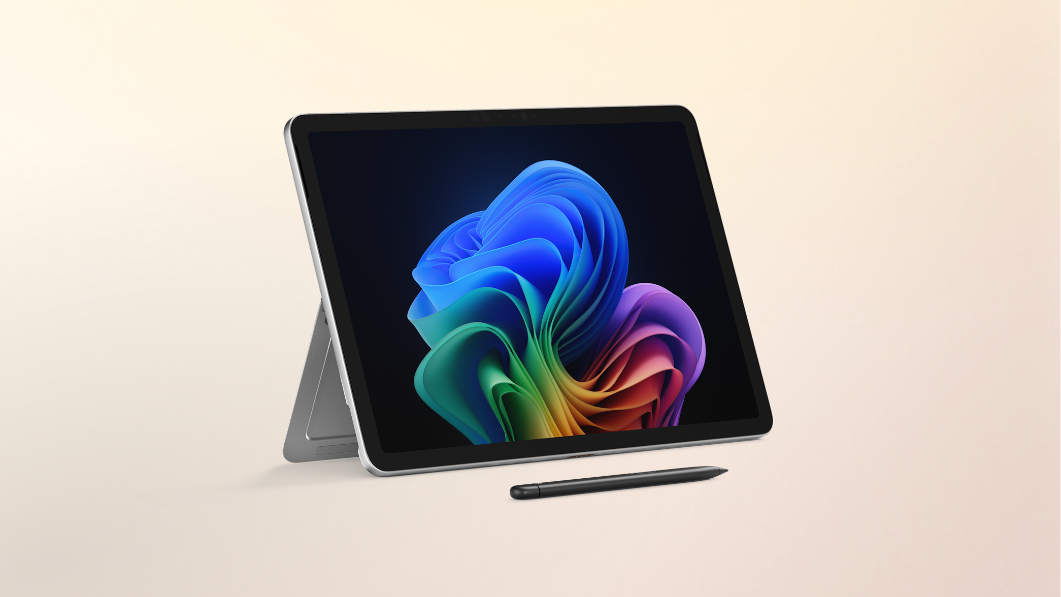 Surface Pro Copilot+ PC 12-inch Snapdragon with a Windows bloom background display on a peach gradient background