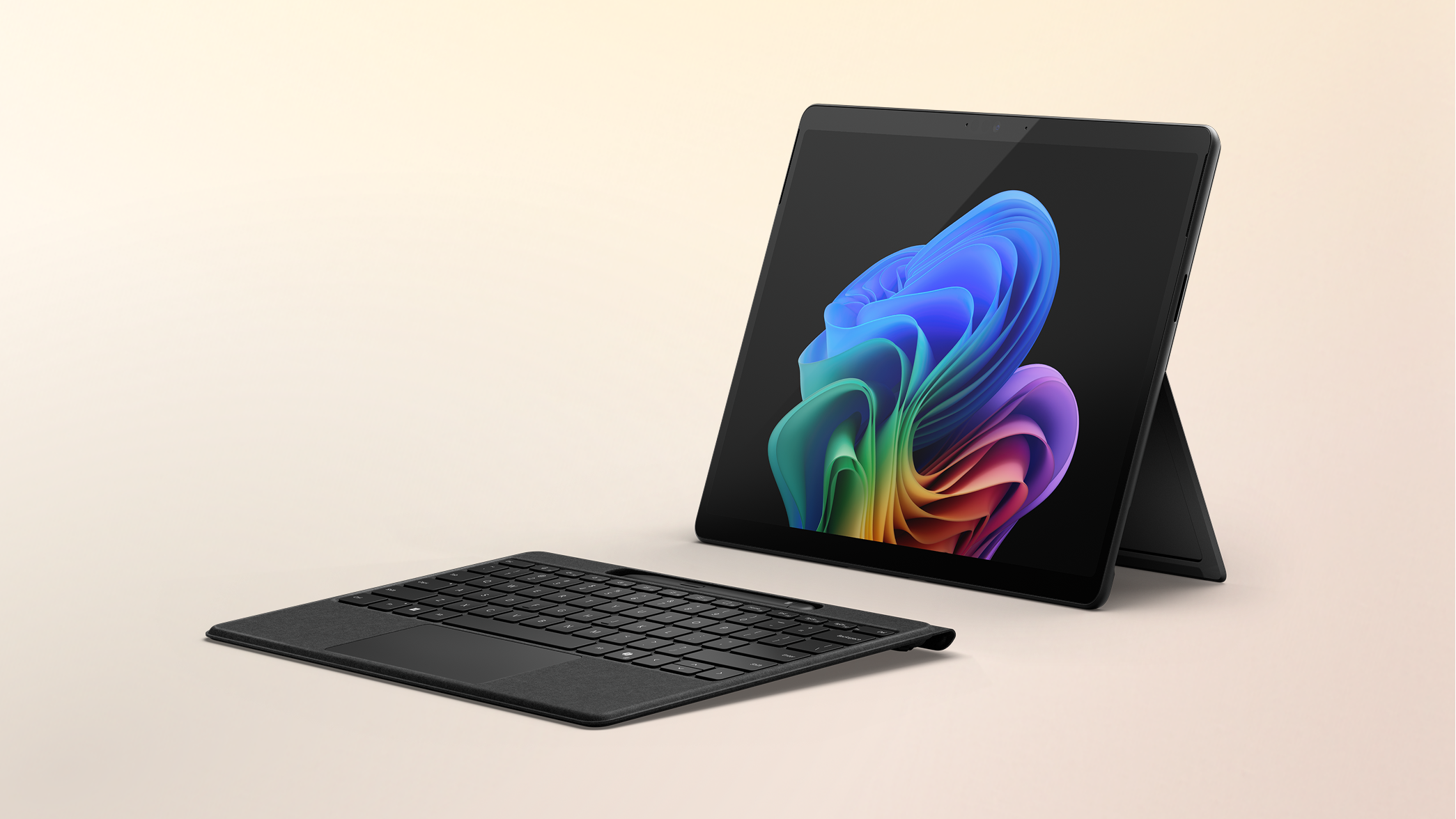 Surface Pro Copilot+ PC 13-inch Snapdragon with a Windows bloom background display on a peach gradient background