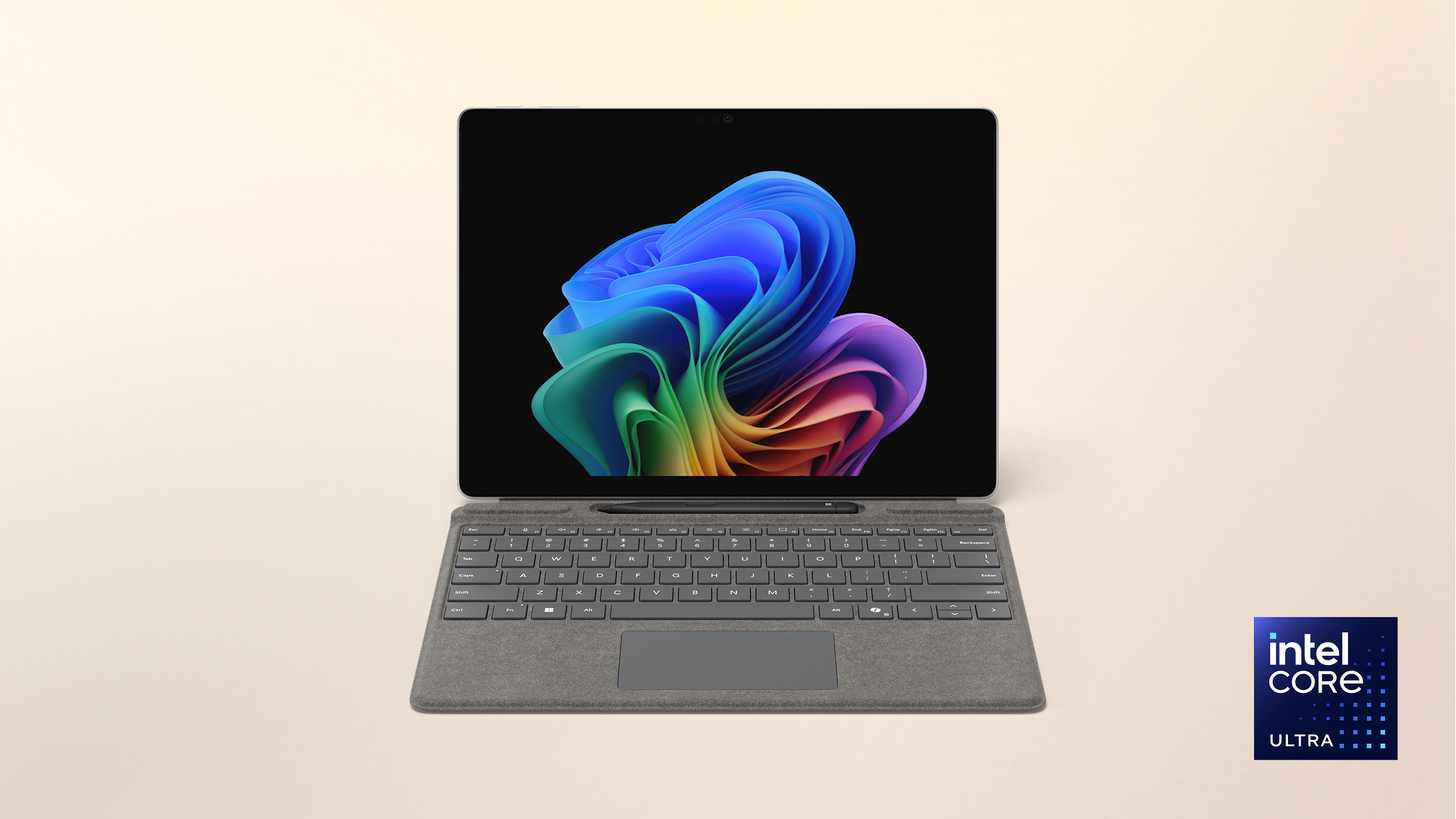 Surface Pro Copilot+ PC 13-inch Intel with a Windows bloom background display on a peach gradient background