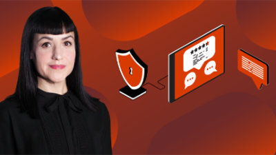 A person standing in front of a computer screen