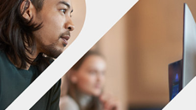 A close-up of a person looking at computer