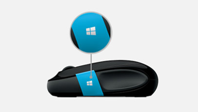 親指用の Windows タッチ タブを強調表示している、Sculpt Comfort Mouse の側面図