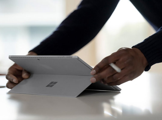 Surface Pro 7+ shown from behind in kickstand mode.