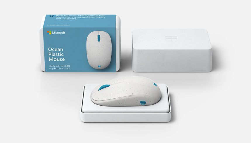ラベルを貼付した箱の外側、箱の内側、マウスを示す Microsoft Ocean マウスの梱包材。