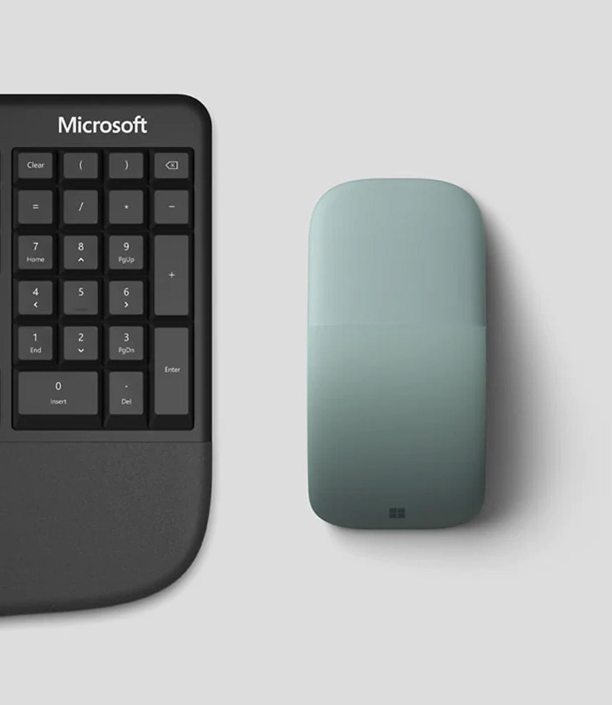 Microsoft 人體工學鍵盤與 Microsoft Arc Mouse《Microsoft Arc 滑鼠》