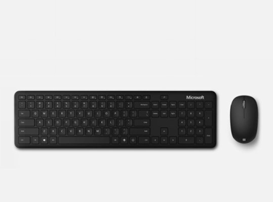 The Microsoft Bluetooth Keyboard next to the Microsoft Bluetooth Mouse on a desk