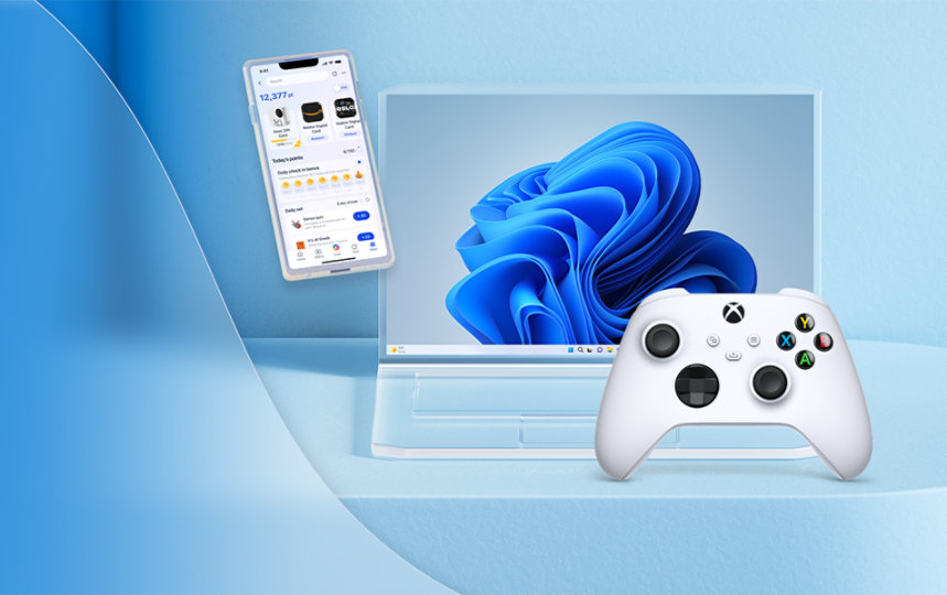 A grouping of devices, including an Xbox controller, a glass phone and a glass laptop.