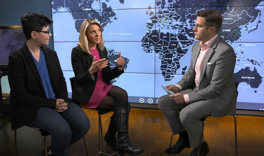 Still image from video showing Alex Bradley, Siobhan Gorman, and Diana Kelley sitting across from each other having a conversation