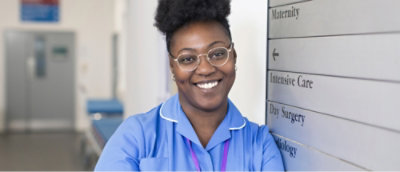 A person wearing glasses and a blue shirt