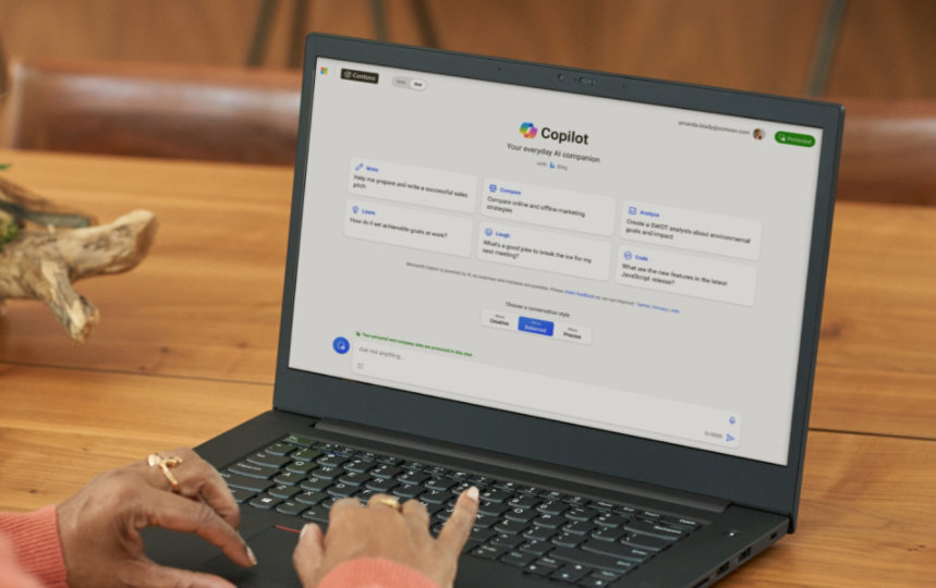 A person launching Microsoft 365 Copilot Chat in a laptop.