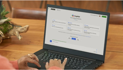 A person launching Microsoft Copilot on a laptop.