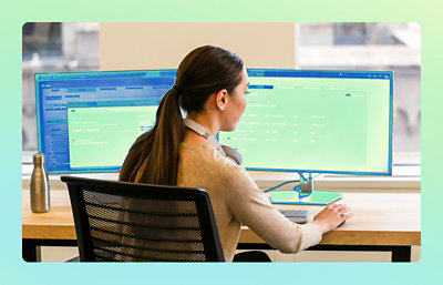 A women working with desktop.