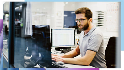 A person working on the computer.