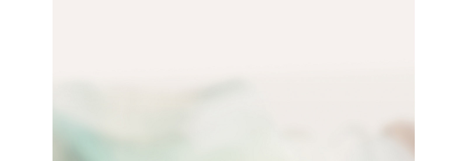 Blurred abstract background with soft pastel colors.