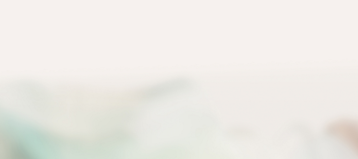 Blurred abstract background with soft pastel colors.