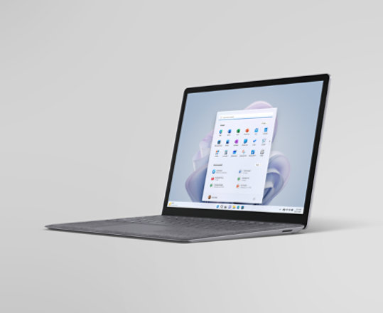 A Surface Laptop 5 in Platinum with Alcantara keyboard cover.