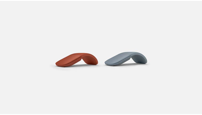Surface Arc Mouse devices in Poppy Red and Ice Blue.