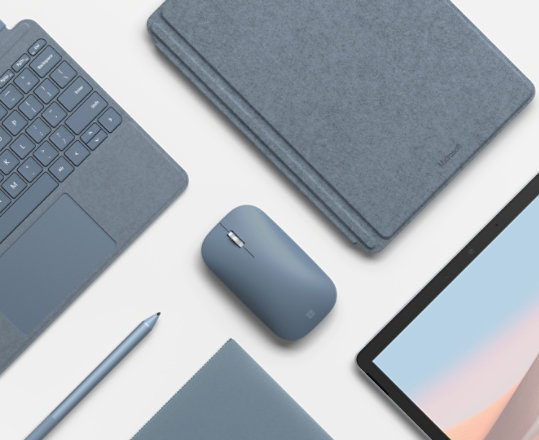 Surface Mobile Mouse surrounded by matching devices and accessories.