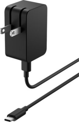 Schrägansicht von der Seite des Surface 23W U S B C netzteil mit einem leistung stecker und U S B C stecker. 