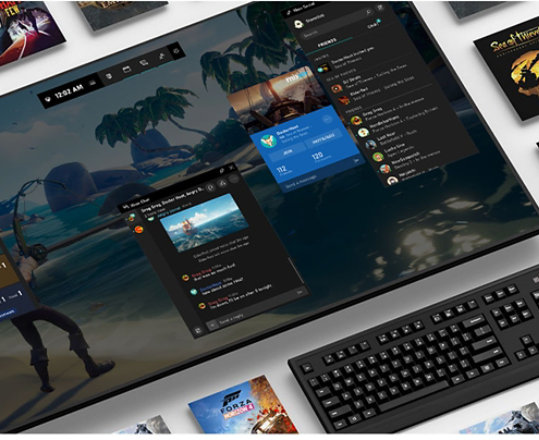 Windows 10 and Xbox games surround a digital screen with a keyboard, mouse, and controller.