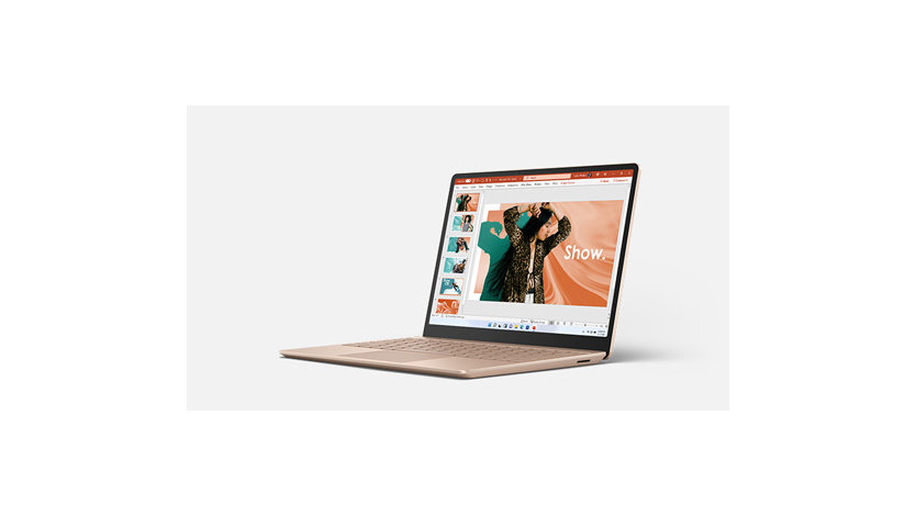 Surface Laptop Go in Sandstone with PowerPoint onscreen.
