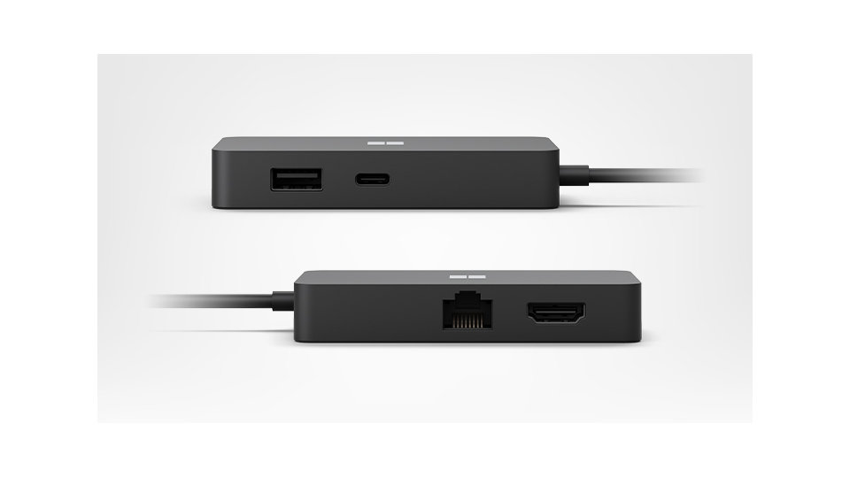 Beide kanten van de Travel Hub met USB-, Ethernet- en HDMI-poorten.