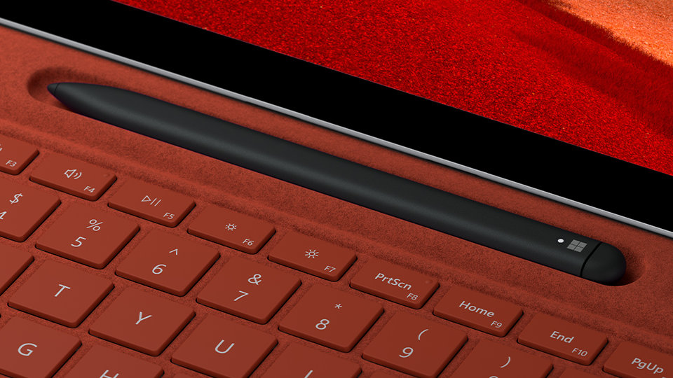 Surface Slim Pen 2 stored inside Surface Pro Signature Keyboard.