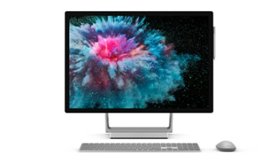 Surface Studio 2 in desktop mode with a keyboard and mouse.