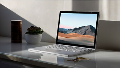 Surface Book 3 for Business with a Windows 10 screensaver.
