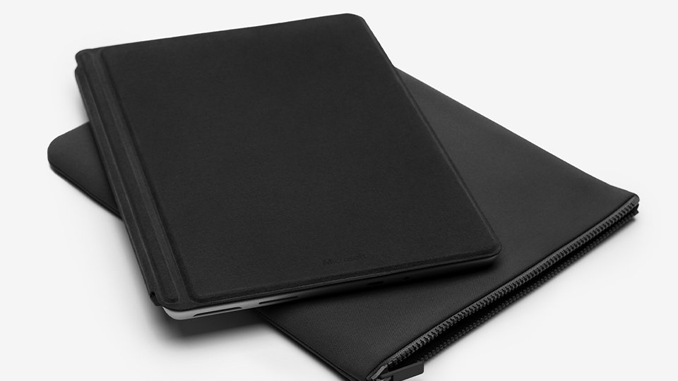Surface Go on top of Surface Go Sleeve in Matte Black.