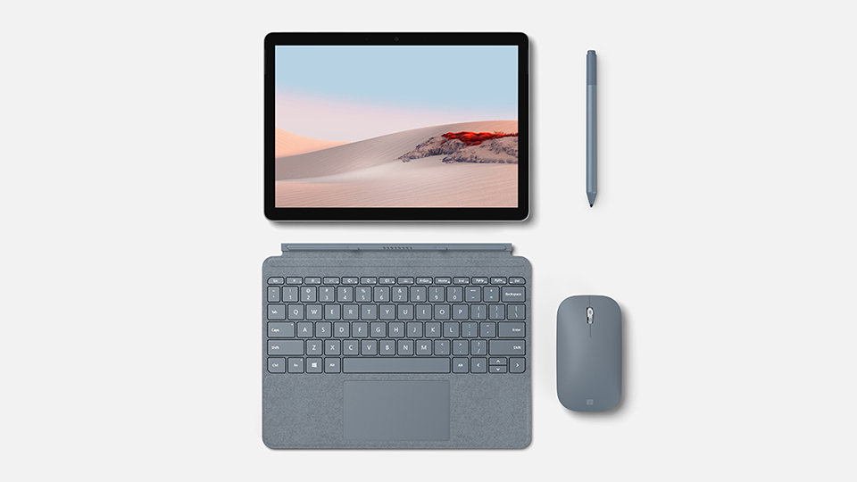 A Surface Go device with a Type Cover, touch pen and mouse.