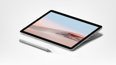 Komputer Surface Go 2 dla firm w trybie komputera do pracy twórczej leżący płasko razem z piórem